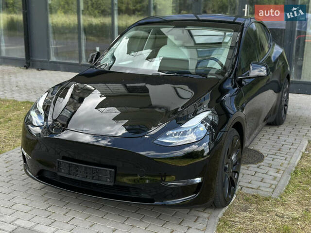 Черный Тесла Model Y, объемом двигателя 0 л и пробегом 13 тыс. км за 28999 $, фото 1 на Automoto.ua