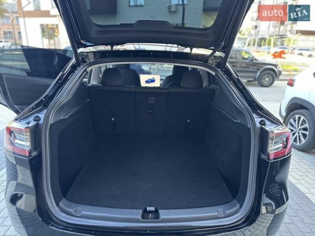 Черный Тесла Model Y, объемом двигателя 0 л и пробегом 65 тыс. км за 25555 $, фото 18 на Automoto.ua