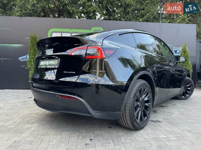 Черный Тесла Model Y, объемом двигателя 0 л и пробегом 1 тыс. км за 33900 $, фото 55 на Automoto.ua