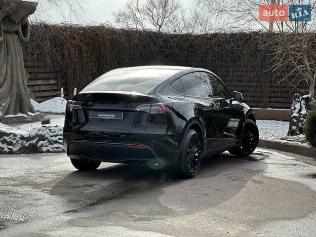 Черный Тесла Model Y, объемом двигателя 0 л и пробегом 1 тыс. км за 40500 $, фото 44 на Automoto.ua