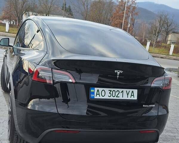 Черный Тесла Model Y, объемом двигателя 0 л и пробегом 27 тыс. км за 31300 $, фото 4 на Automoto.ua
