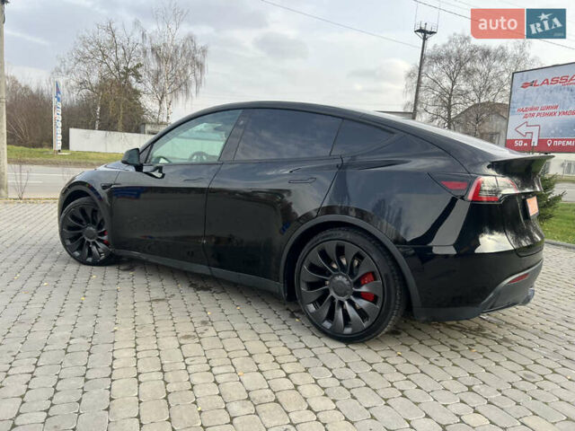 Черный Тесла Model Y, объемом двигателя 0 л и пробегом 25 тыс. км за 31500 $, фото 37 на Automoto.ua