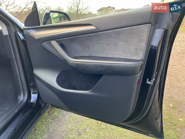 Черный Тесла Model Y, объемом двигателя 0 л и пробегом 36 тыс. км за 24500 $, фото 18 на Automoto.ua