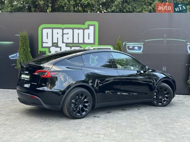 Черный Тесла Model Y, объемом двигателя 0 л и пробегом 1 тыс. км за 33900 $, фото 57 на Automoto.ua