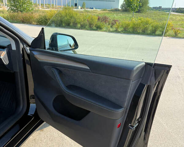 Черный Тесла Model Y, объемом двигателя 0 л и пробегом 22 тыс. км за 26500 $, фото 19 на Automoto.ua
