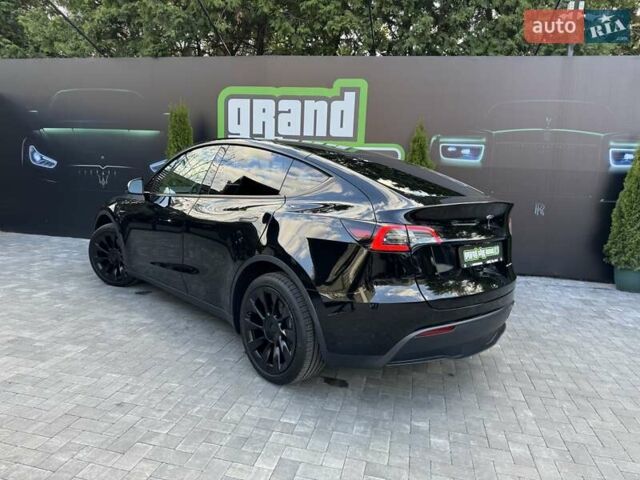 Черный Тесла Model Y, объемом двигателя 0 л и пробегом 1 тыс. км за 33900 $, фото 42 на Automoto.ua