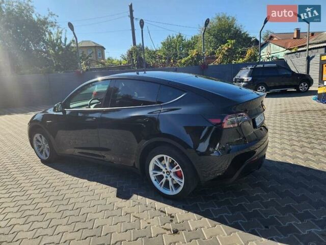 Черный Тесла Model Y, объемом двигателя 0 л и пробегом 27 тыс. км за 27500 $, фото 20 на Automoto.ua
