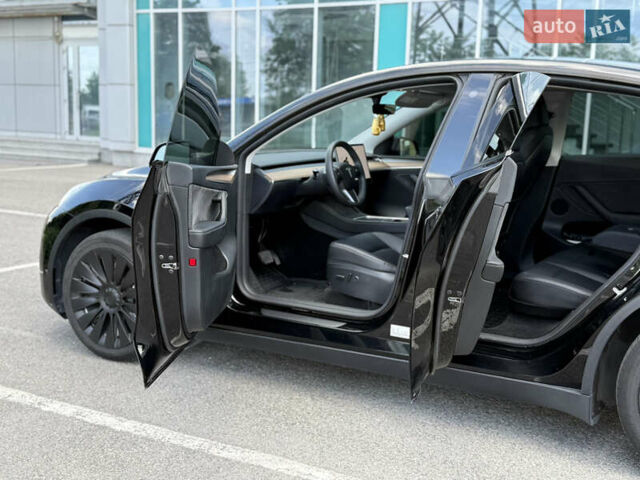 Чорний Тесла Model Y, об'ємом двигуна 0 л та пробігом 58 тис. км за 26400 $, фото 16 на Automoto.ua