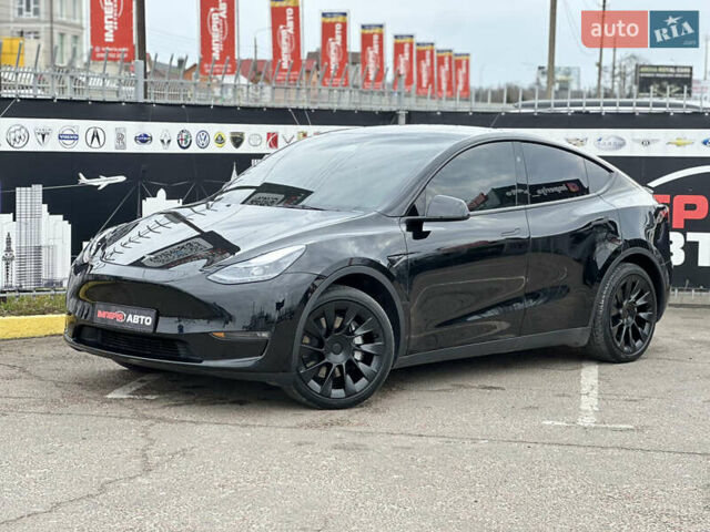 Черный Тесла Model Y, объемом двигателя 0 л и пробегом 32 тыс. км за 29900 $, фото 1 на Automoto.ua