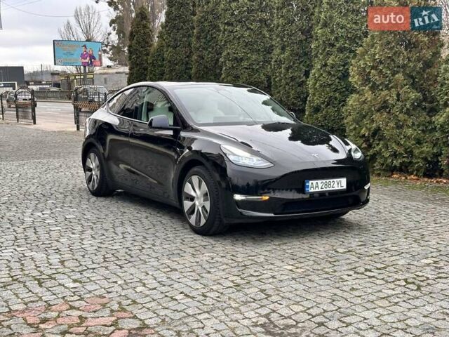Чорний Тесла Model Y, об'ємом двигуна 0 л та пробігом 99 тис. км за 22999 $, фото 11 на Automoto.ua