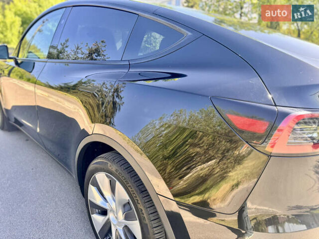 Чорний Тесла Model Y, об'ємом двигуна 0 л та пробігом 48 тис. км за 28999 $, фото 4 на Automoto.ua