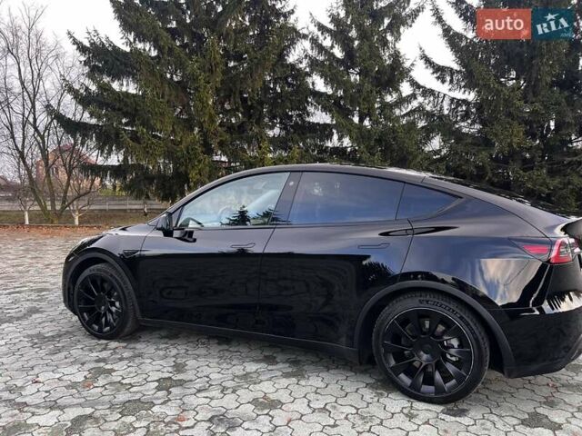 Черный Тесла Model Y, объемом двигателя 0 л и пробегом 64 тыс. км за 29100 $, фото 3 на Automoto.ua