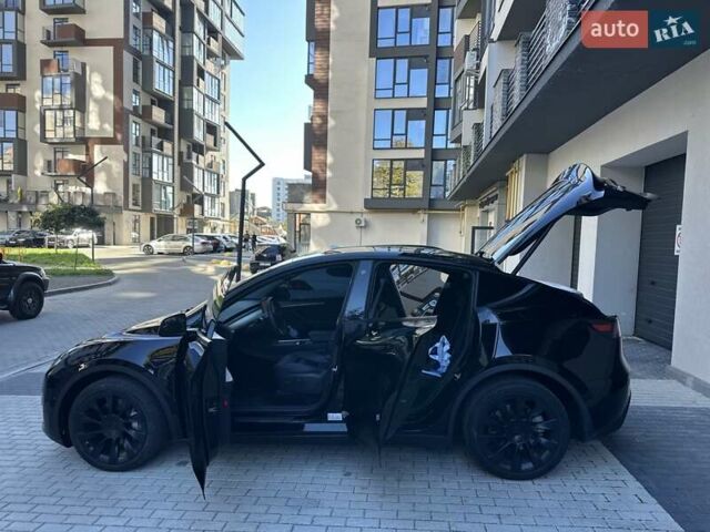 Черный Тесла Model Y, объемом двигателя 0 л и пробегом 65 тыс. км за 25555 $, фото 12 на Automoto.ua
