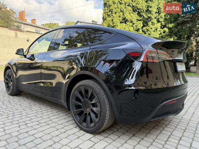 Черный Тесла Model Y, объемом двигателя 0 л и пробегом 58 тыс. км за 27500 $, фото 3 на Automoto.ua