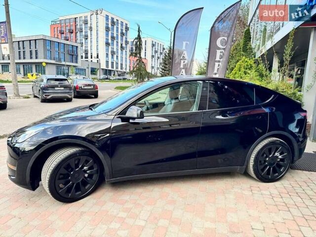 Черный Тесла Model Y, объемом двигателя 0 л и пробегом 10 тыс. км за 33999 $, фото 1 на Automoto.ua