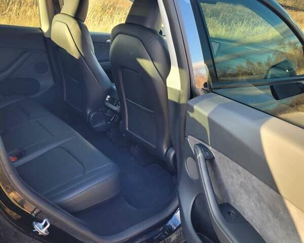 Черный Тесла Model Y, объемом двигателя 0 л и пробегом 57 тыс. км за 23600 $, фото 20 на Automoto.ua