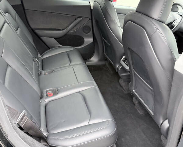 Черный Тесла Model Y, объемом двигателя 0 л и пробегом 84 тыс. км за 25900 $, фото 34 на Automoto.ua