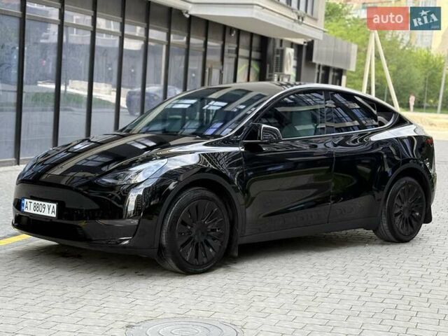 Черный Тесла Model Y, объемом двигателя 0 л и пробегом 28 тыс. км за 28990 $, фото 2 на Automoto.ua