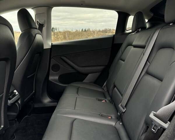 Черный Тесла Model Y, объемом двигателя 0 л и пробегом 10 тыс. км за 29800 $, фото 44 на Automoto.ua