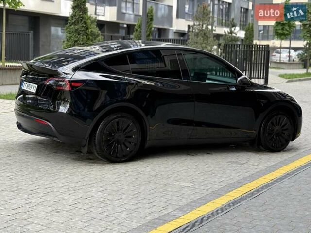 Черный Тесла Model Y, объемом двигателя 0 л и пробегом 28 тыс. км за 28990 $, фото 11 на Automoto.ua