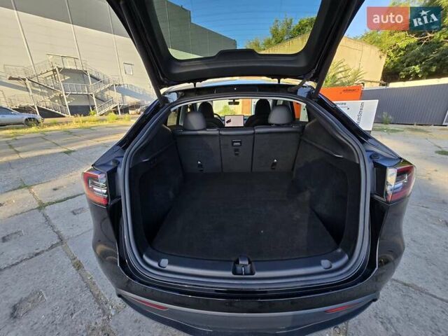 Чорний Тесла Model Y, об'ємом двигуна 0 л та пробігом 95 тис. км за 27300 $, фото 40 на Automoto.ua