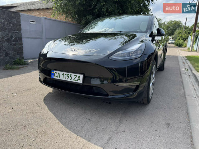 Черный Тесла Model Y, объемом двигателя 0 л и пробегом 28 тыс. км за 31500 $, фото 5 на Automoto.ua