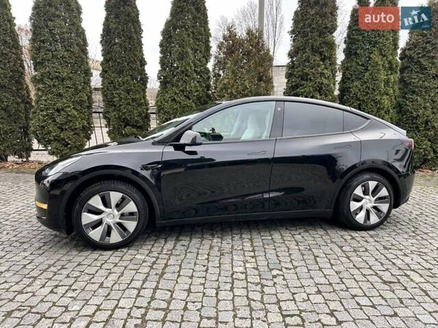Чорний Тесла Model Y, об'ємом двигуна 0 л та пробігом 99 тис. км за 22999 $, фото 2 на Automoto.ua