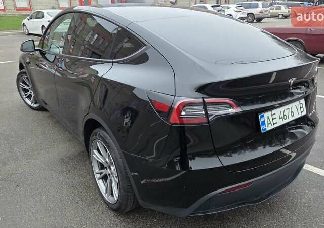 Черный Тесла Model Y, объемом двигателя 0 л и пробегом 49 тыс. км за 28900 $, фото 6 на Automoto.ua