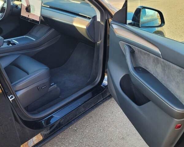 Черный Тесла Model Y, объемом двигателя 0 л и пробегом 57 тыс. км за 23600 $, фото 22 на Automoto.ua