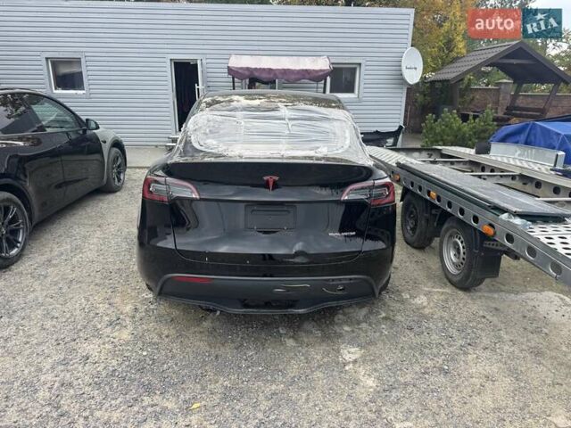 Тесла Model Y 2023 в Сарнах на Automoto.ua Черный Тесла Model Y, объемом двигателя 0 л и пробегом 41 тыс. км за 16850 $, фото 5 на Automoto.ua