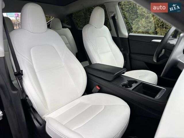 Чорний Тесла Model Y, об'ємом двигуна 0 л та пробігом 99 тис. км за 22999 $, фото 17 на Automoto.ua