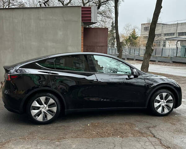 Черный Тесла Model Y, объемом двигателя 0 л и пробегом 98 тыс. км за 27000 $, фото 7 на Automoto.ua