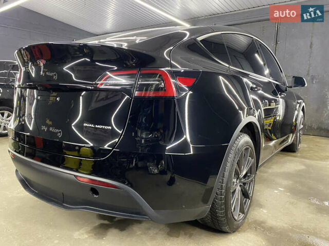 Черный Тесла Model Y, объемом двигателя 0 л и пробегом 71 тыс. км за 29000 $, фото 6 на Automoto.ua