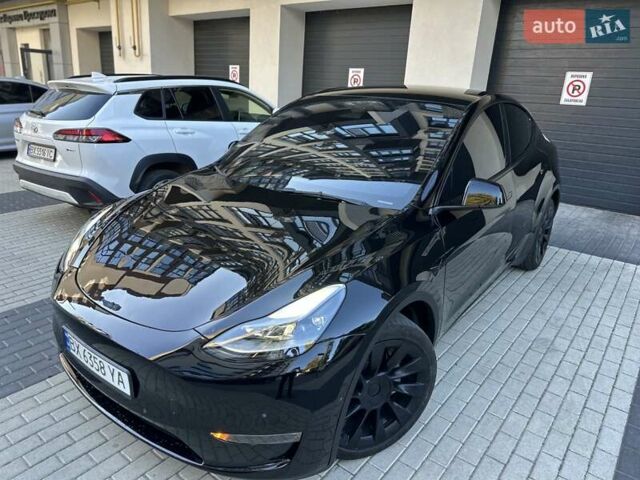 Черный Тесла Model Y, объемом двигателя 0 л и пробегом 65 тыс. км за 25555 $, фото 2 на Automoto.ua