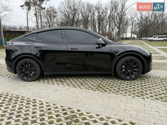 Черный Тесла Model Y, объемом двигателя 0 л и пробегом 80 тыс. км за 28000 $, фото 5 на Automoto.ua