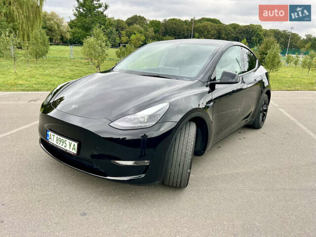Черный Тесла Model Y, объемом двигателя 0 л и пробегом 25 тыс. км за 29500 $, фото 2 на Automoto.ua