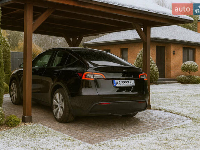 Черный Тесла Model Y, объемом двигателя 0 л и пробегом 99 тыс. км за 24999 $, фото 1 на Automoto.ua