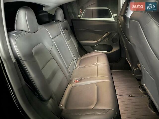 Черный Тесла Model Y, объемом двигателя 0 л и пробегом 39 тыс. км за 29500 $, фото 25 на Automoto.ua