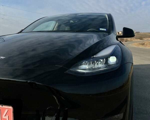 Черный Тесла Model Y, объемом двигателя 0 л и пробегом 10 тыс. км за 29800 $, фото 1 на Automoto.ua