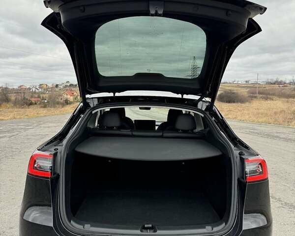 Черный Тесла Model Y, объемом двигателя 0 л и пробегом 10 тыс. км за 29800 $, фото 18 на Automoto.ua