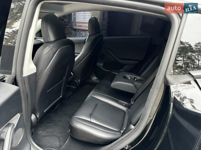 Чорний Тесла Model Y, об'ємом двигуна 0 л та пробігом 56 тис. км за 28700 $, фото 37 на Automoto.ua