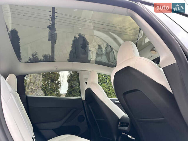Черный Тесла Model Y, объемом двигателя 0 л и пробегом 99 тыс. км за 24999 $, фото 23 на Automoto.ua