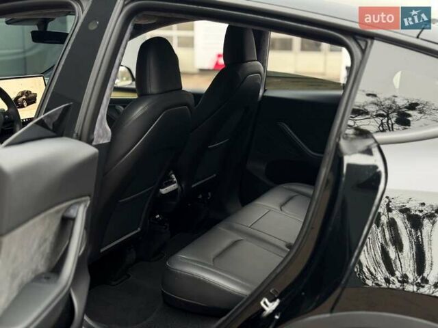 Чорний Тесла Model Y, об'ємом двигуна 0 л та пробігом 28 тис. км за 31300 $, фото 14 на Automoto.ua