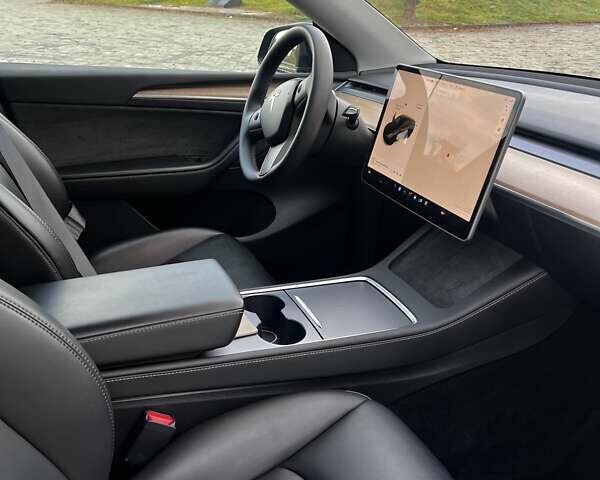 Черный Тесла Model Y, объемом двигателя 0 л и пробегом 64 тыс. км за 29100 $, фото 11 на Automoto.ua