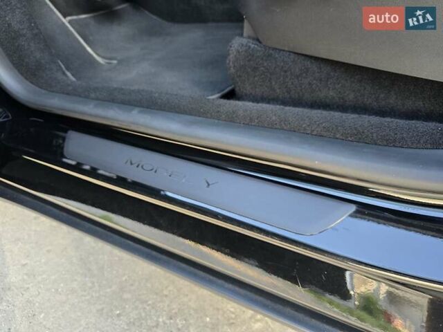 Чорний Тесла Model Y, об'ємом двигуна 0 л та пробігом 95 тис. км за 27300 $, фото 49 на Automoto.ua
