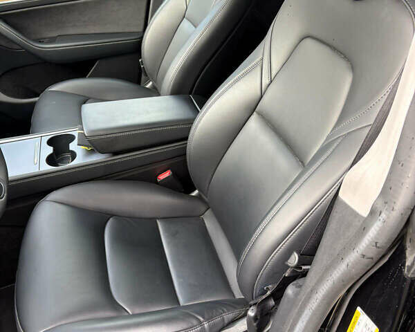 Черный Тесла Model Y, объемом двигателя 0 л и пробегом 59 тыс. км за 18900 $, фото 18 на Automoto.ua