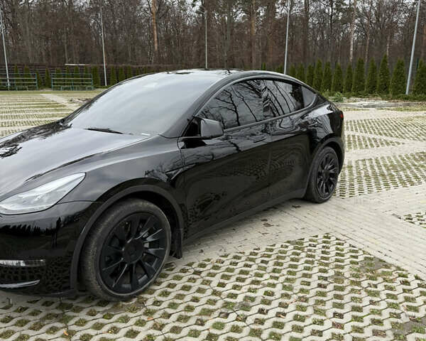 Черный Тесла Model Y, объемом двигателя 0 л и пробегом 80 тыс. км за 28000 $, фото 4 на Automoto.ua