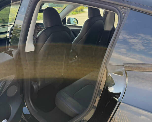 Черный Тесла Model Y, объемом двигателя 0 л и пробегом 22 тыс. км за 26500 $, фото 22 на Automoto.ua