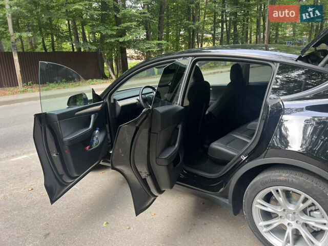 Черный Тесла Model Y, объемом двигателя 0 л и пробегом 21 тыс. км за 29500 $, фото 4 на Automoto.ua