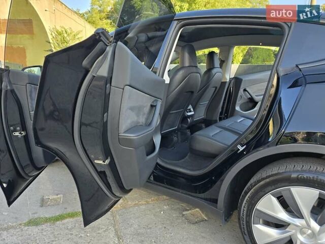Чорний Тесла Model Y, об'ємом двигуна 0 л та пробігом 95 тис. км за 27300 $, фото 29 на Automoto.ua